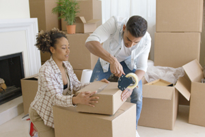 couple packing things into boxes